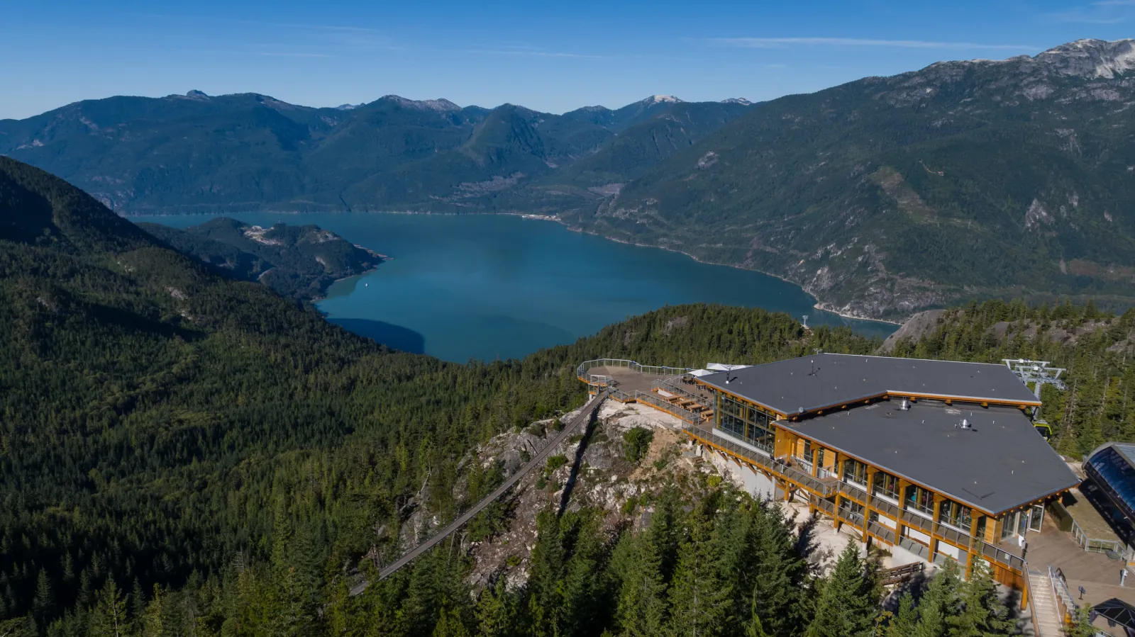 Aerial view of the Sea to Sky Gondola Summit Lodge and ridge above Howe Sound