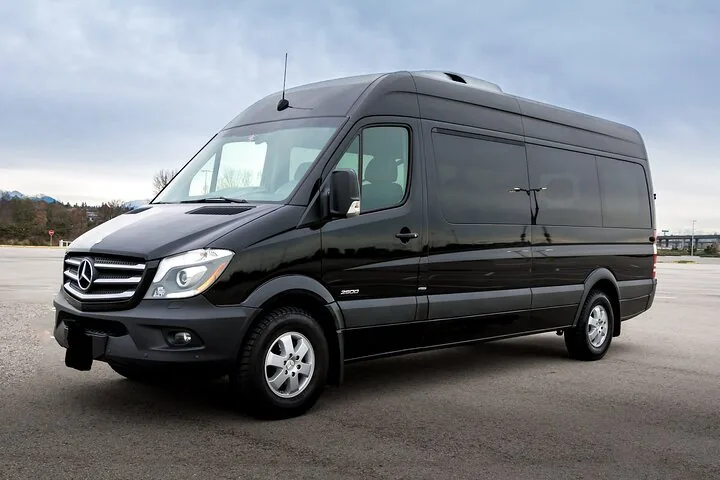 Black Mercedes Sprinter passenger van used for larger private groups